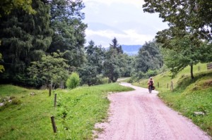Climbing gravel roads on a loaded touring bike requires good strategy; two wheel travel; bicycle touring Slovenia