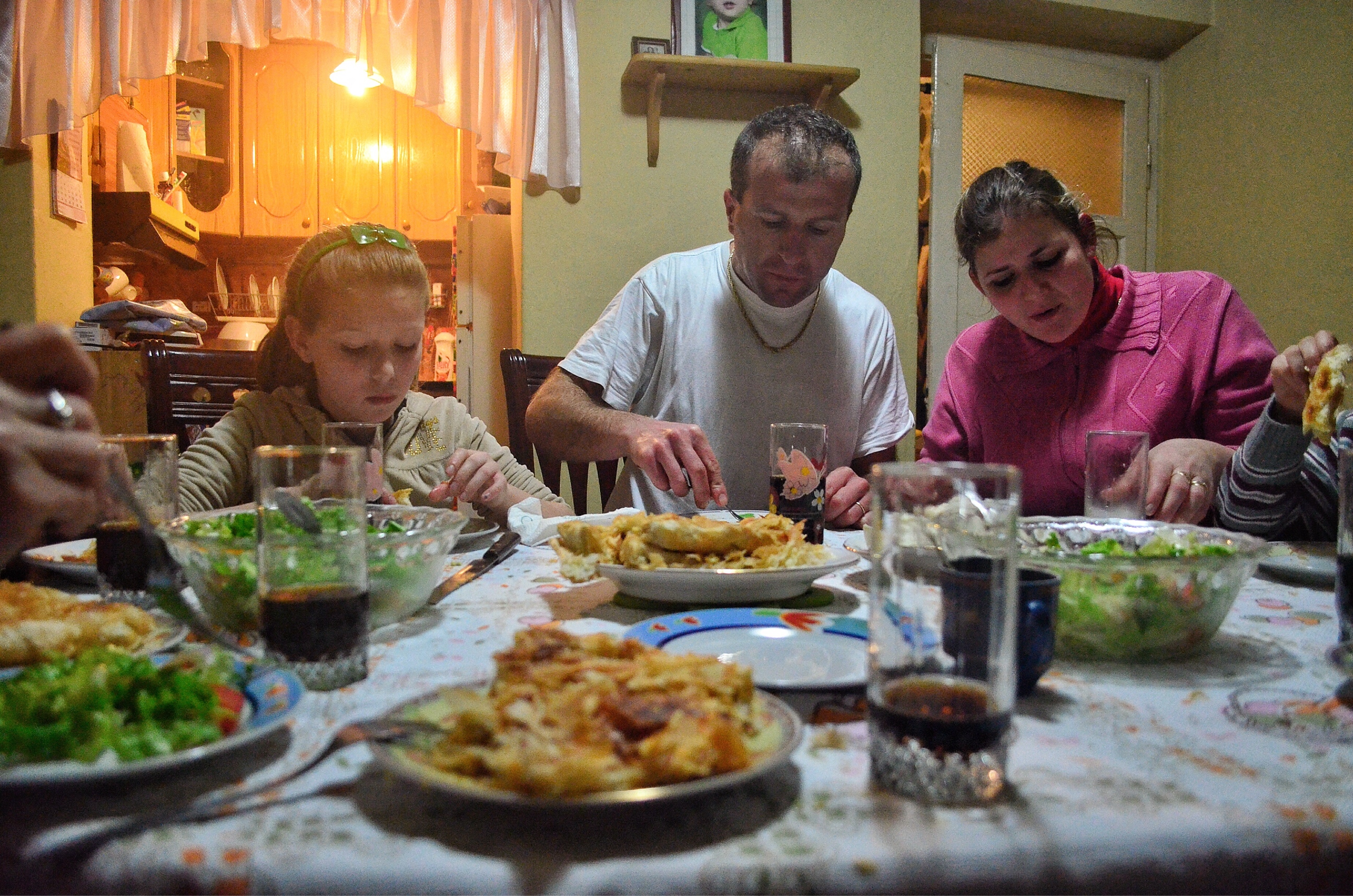 Eating dinner with Warmshowers hosts in Maliq Albania